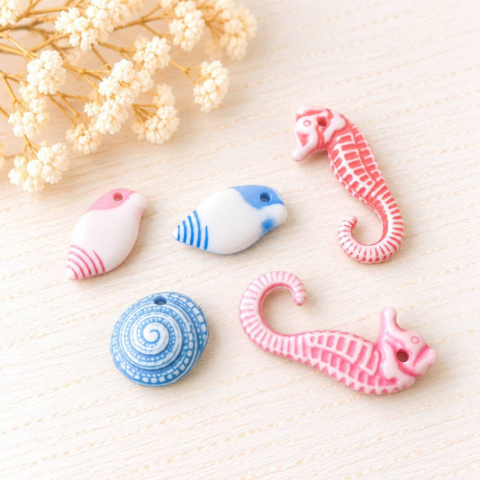 31. Tengerpart stílusú charm - 5 db 1-2 cm